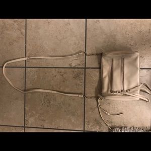 Cream colored smaller purse
